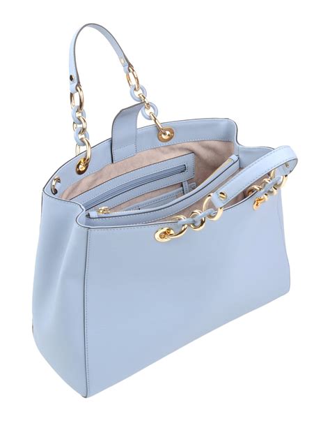 blue michael kors bag with gold studs|Michael Kors outlet blue purse.